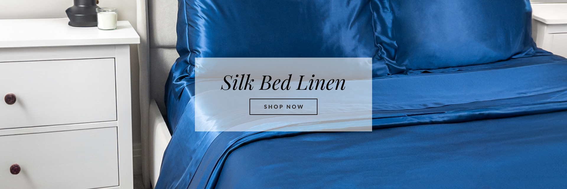 Bed with silk bed linen